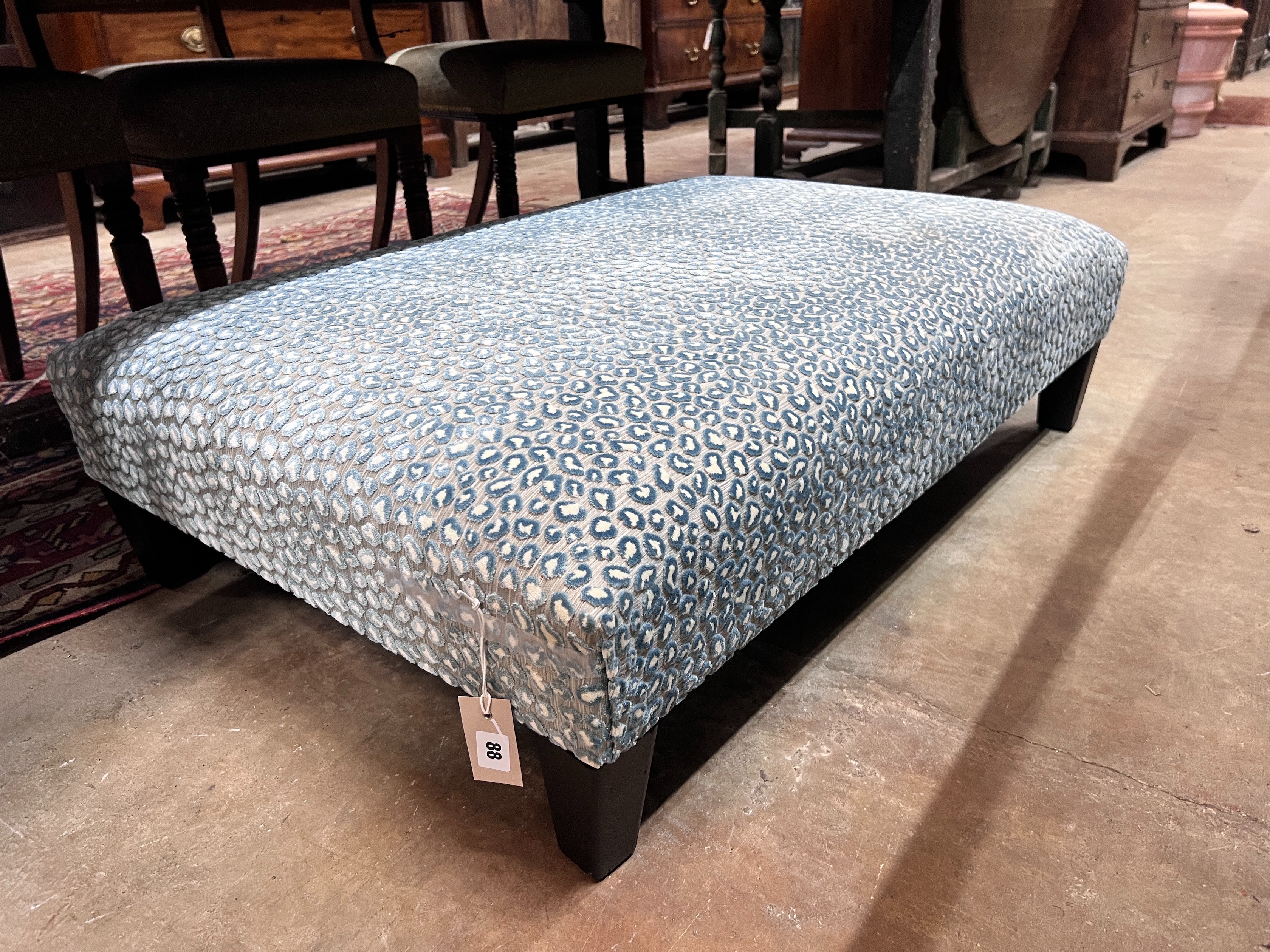 A Colefax & Fowler foot stool, length 103cm, depth 70cm, height 28cm *Please note the sale commences at 9am.